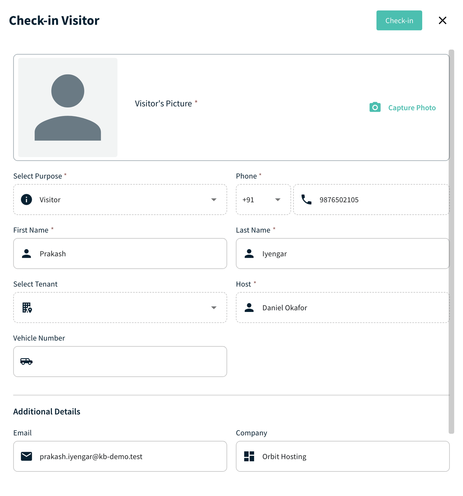 Check-in Visitor panel with prefilled details and the Check-in button